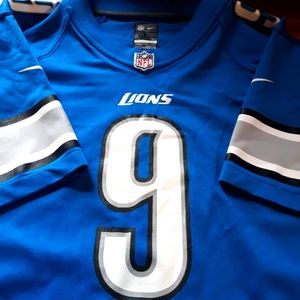 Youth LG Stafford number 9 Lions jersey.